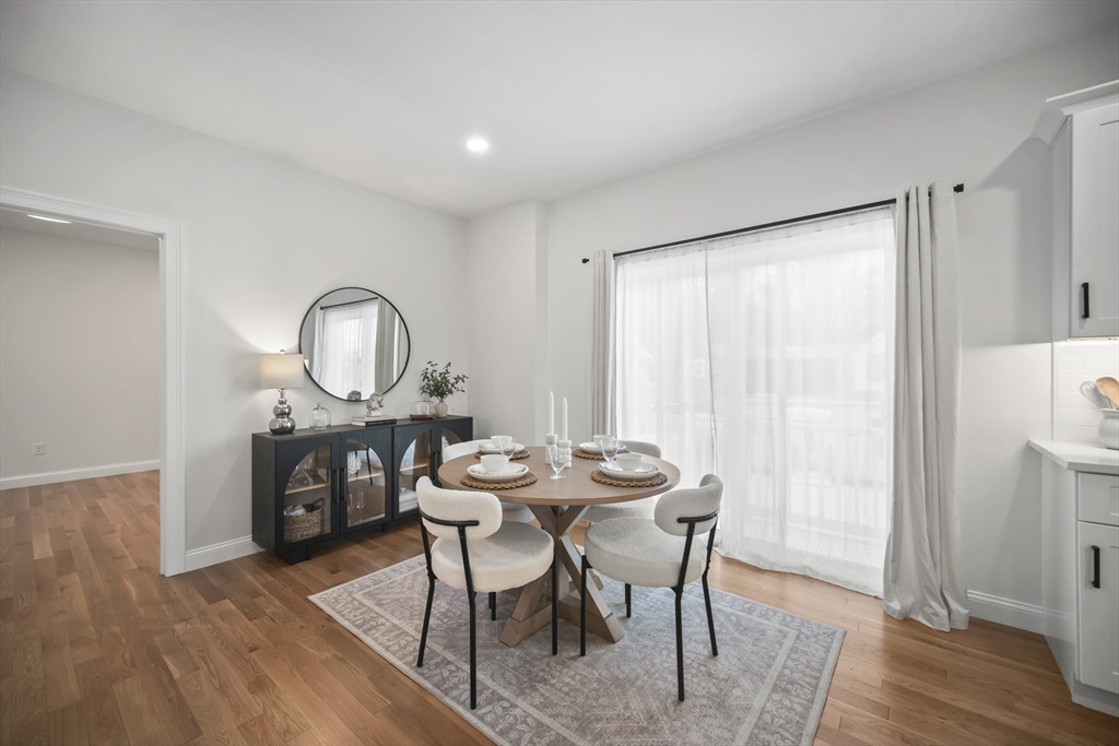16 Clinton Street Marlborough, MA 01752 - Photo 8 of 39 a view of a dining room with furniture window and wooden floor