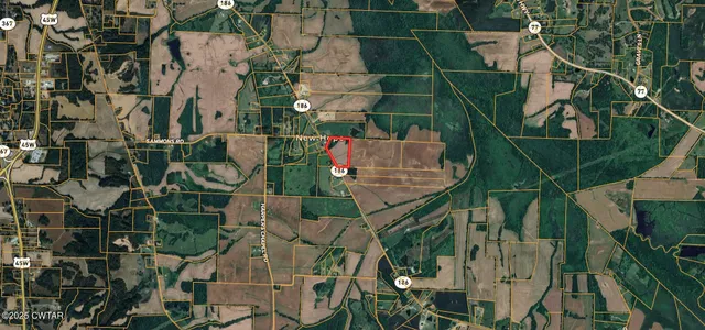 an aerial view of houses and roads