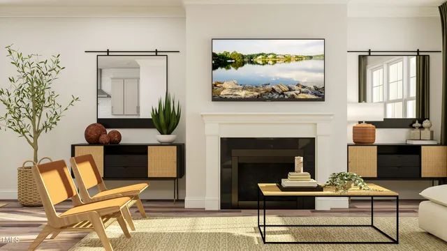 a living room with furniture a table and a fireplace