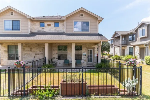 a front view of a house with a porch
