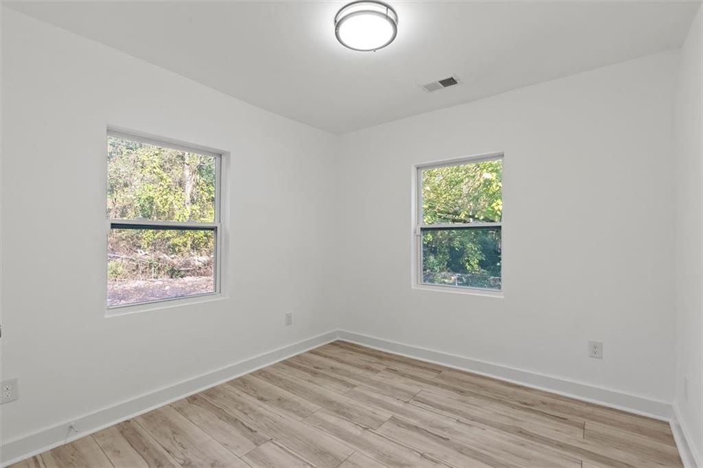 5476 Old Rockbridge Road Stone Mountain, GA 30083 - Photo 18 of 35 a view of room with window