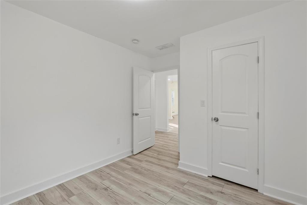 5476 Old Rockbridge Road Stone Mountain, GA 30083 - Photo 19 of 35 a view of an empty room