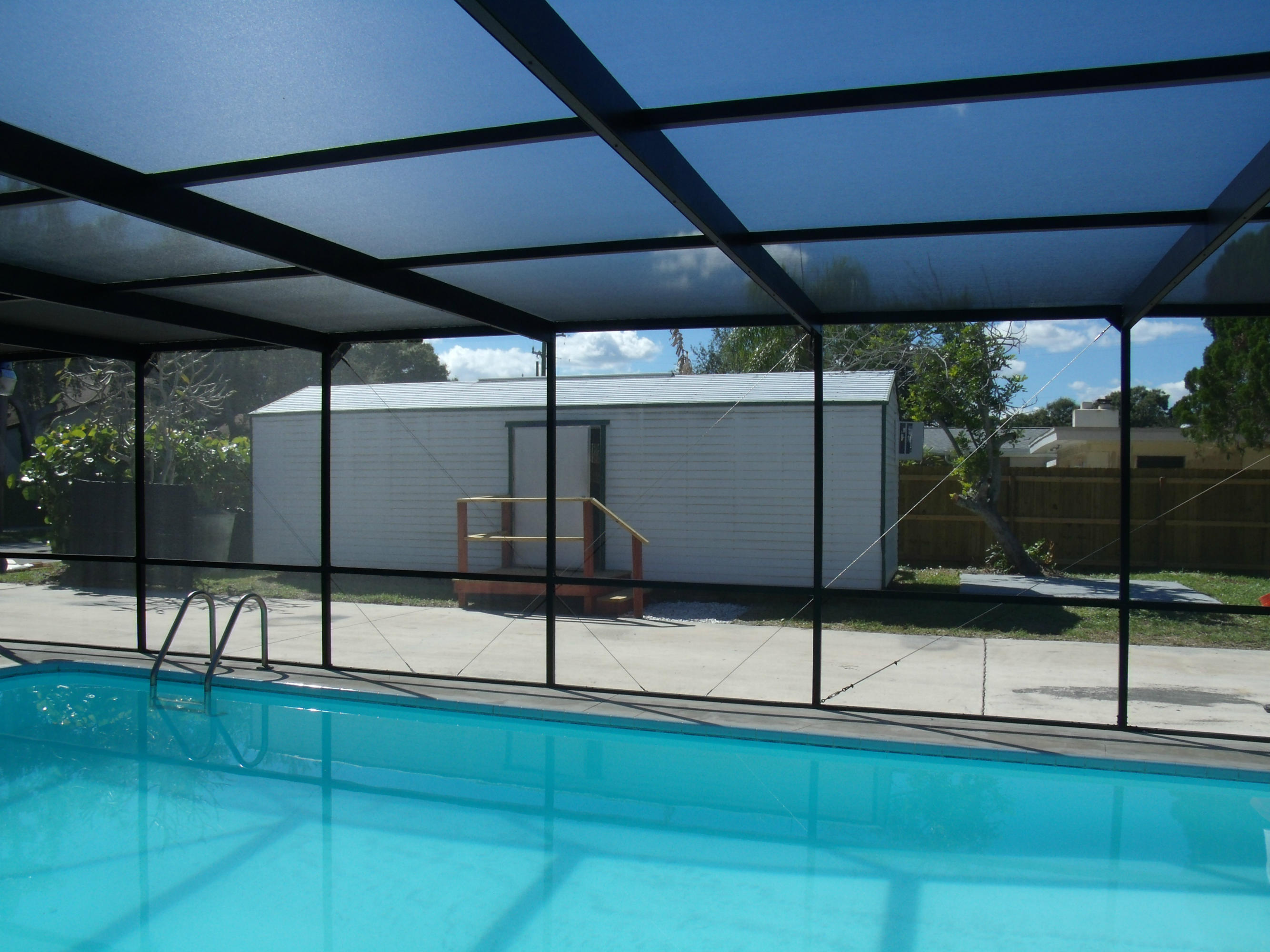 1909 Mayflower Road Fort Pierce, FL 34950 - Photo 39 of 43 Pool & storage in rear