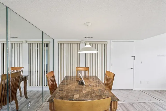 a view of livingroom with furniture and floor to ceiling window