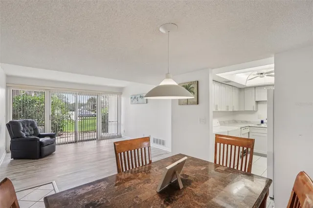 a view of a dining room with furniture
