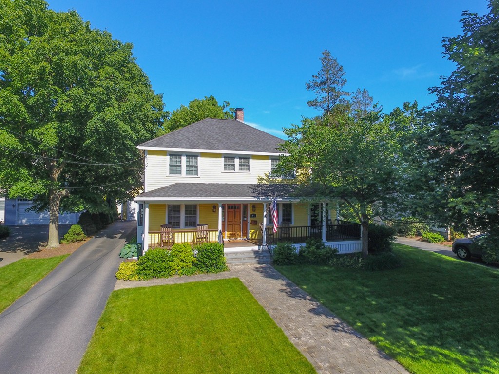 44 Stevens Road Needham, MA 02492 - Photo 1 of 14 a front view of a house with a yard