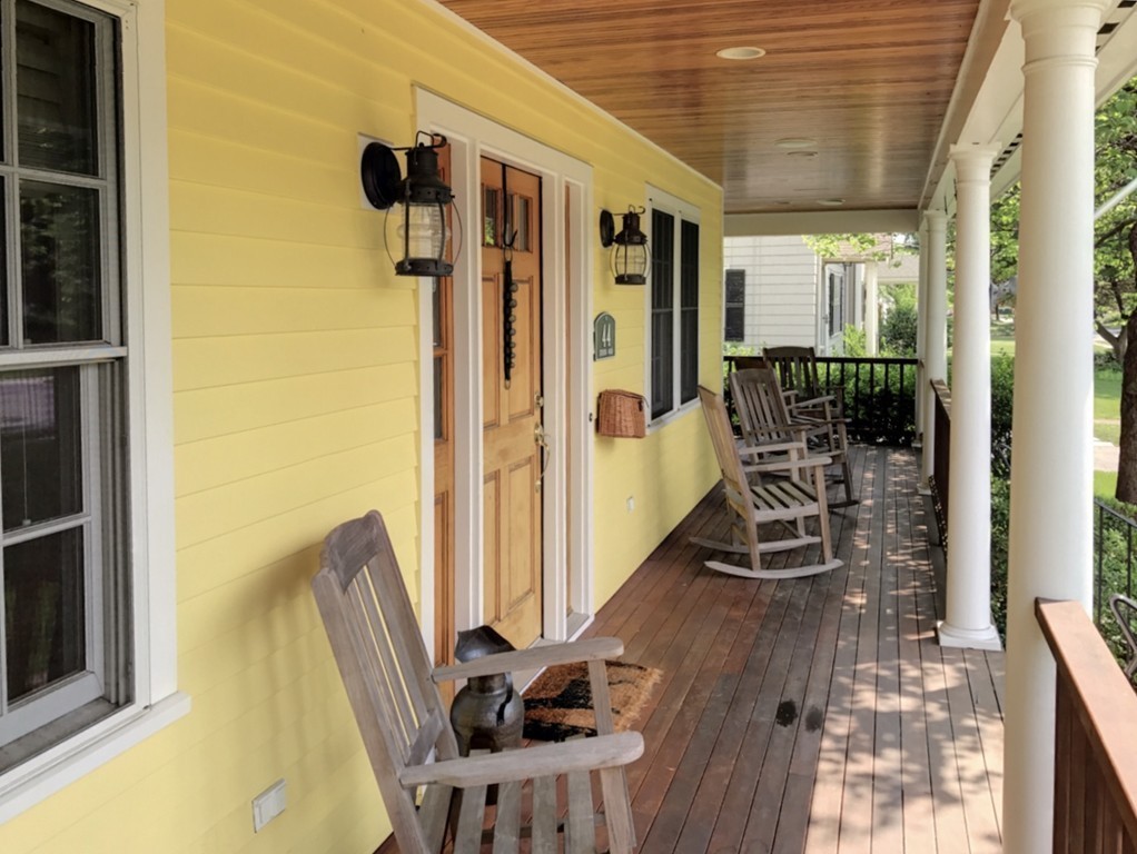 44 Stevens Road Needham, MA 02492 - Photo 3 of 14 a view of a balcony with furniture