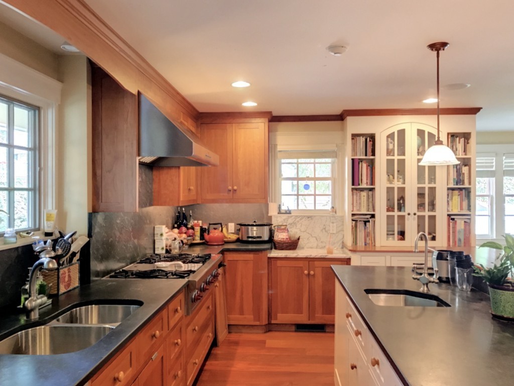 44 Stevens Road Needham, MA 02492 - Photo 6 of 14 a kitchen with lots of counter top space a sink and appliances