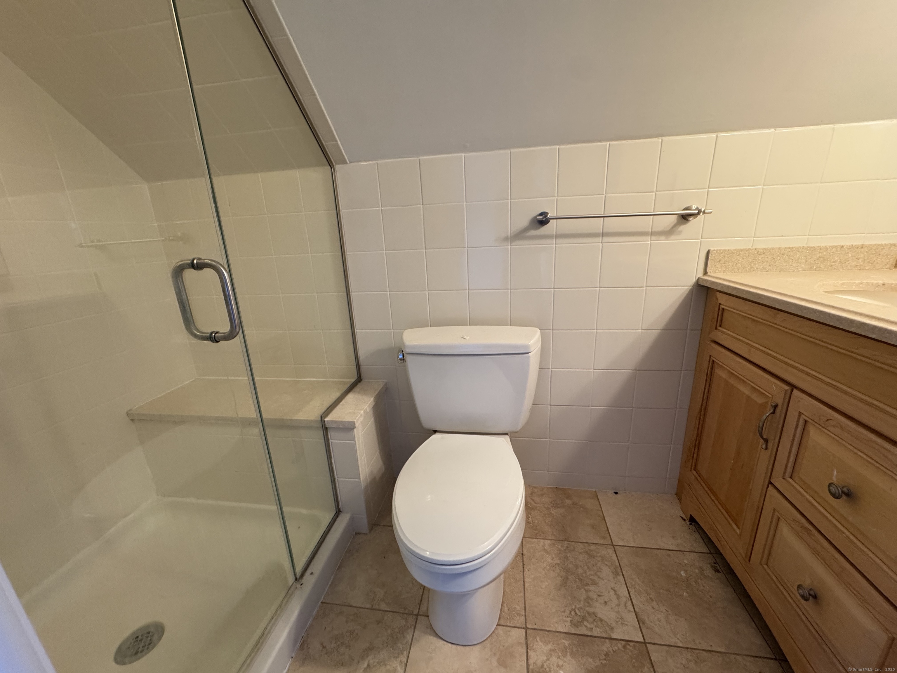 66 Church Lane Westport, CT 06880 - Photo 17 of 22 a bathroom with a toilet and a shower