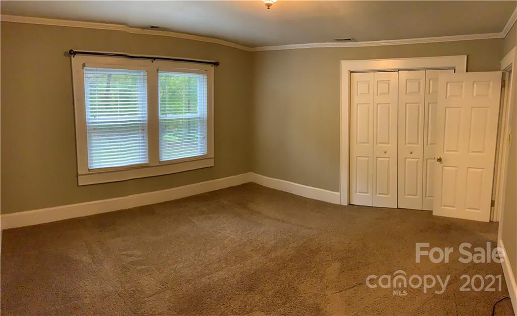 317 Tryon Road Rutherfordton, NC 28139 - Photo 8 of 10 an empty room with a window