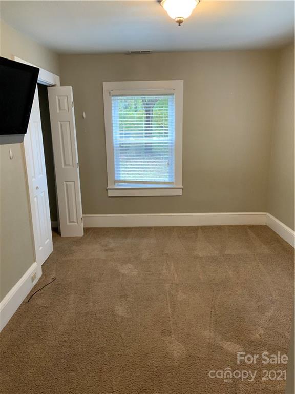 317 Tryon Road Rutherfordton, NC 28139 - Photo 9 of 10 an empty room with windows