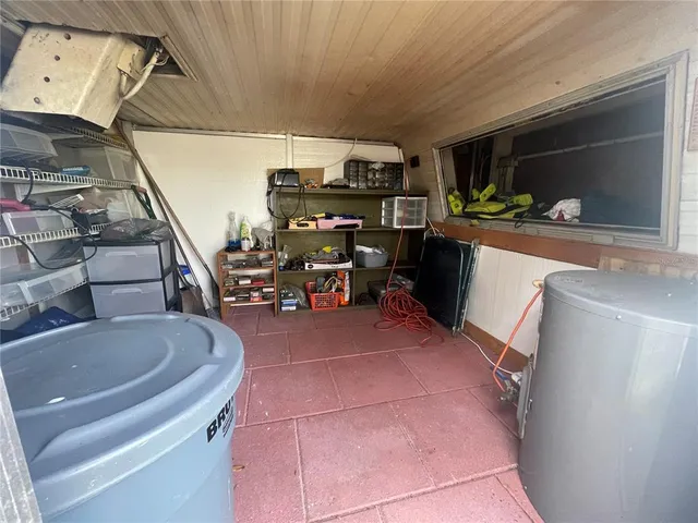 a view of a chairs and table in a balcony