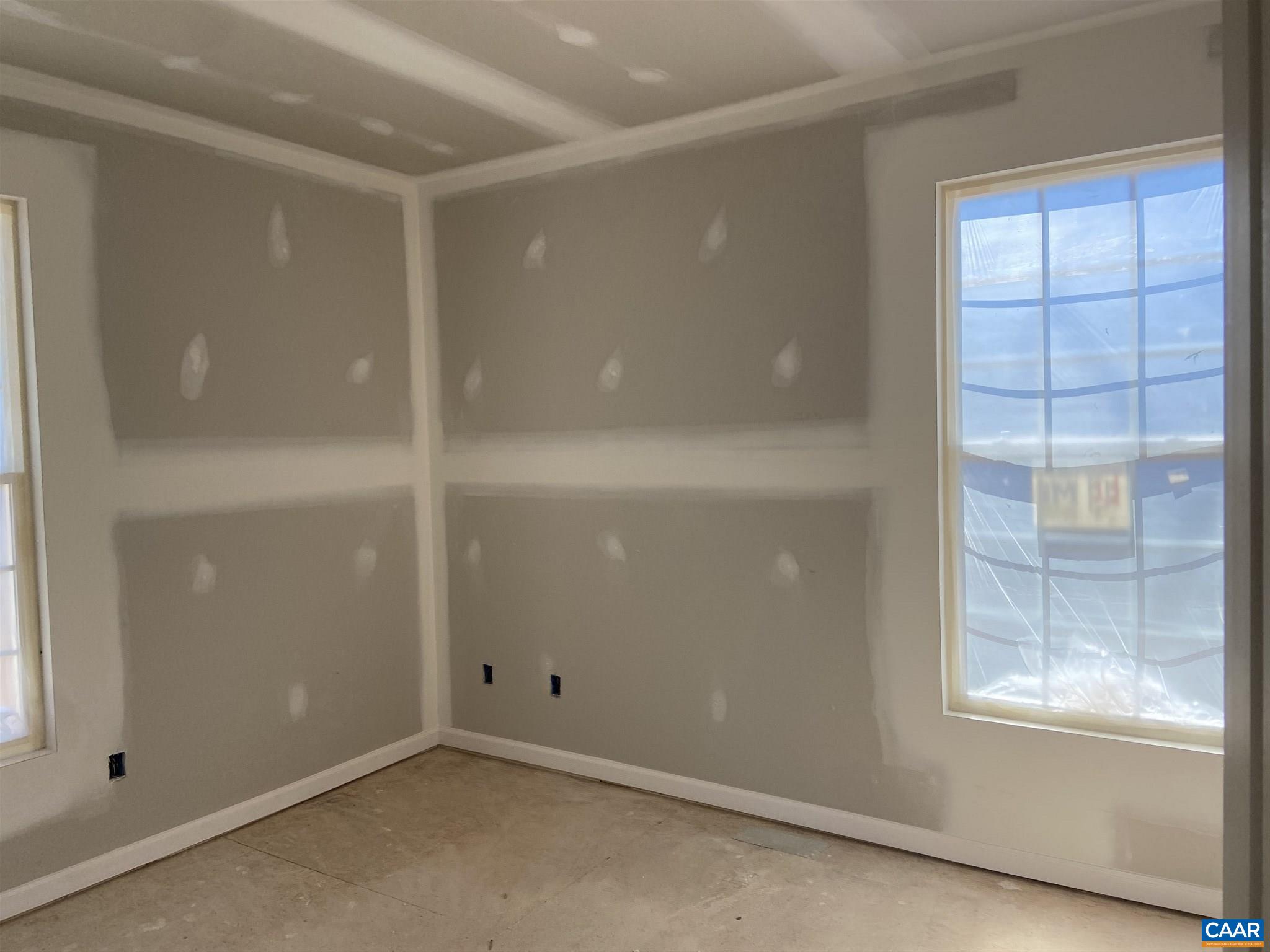 551 West Daffodil Road Ruckersville, VA 22968 - Photo 12 of 20 an empty room with windows and closet
