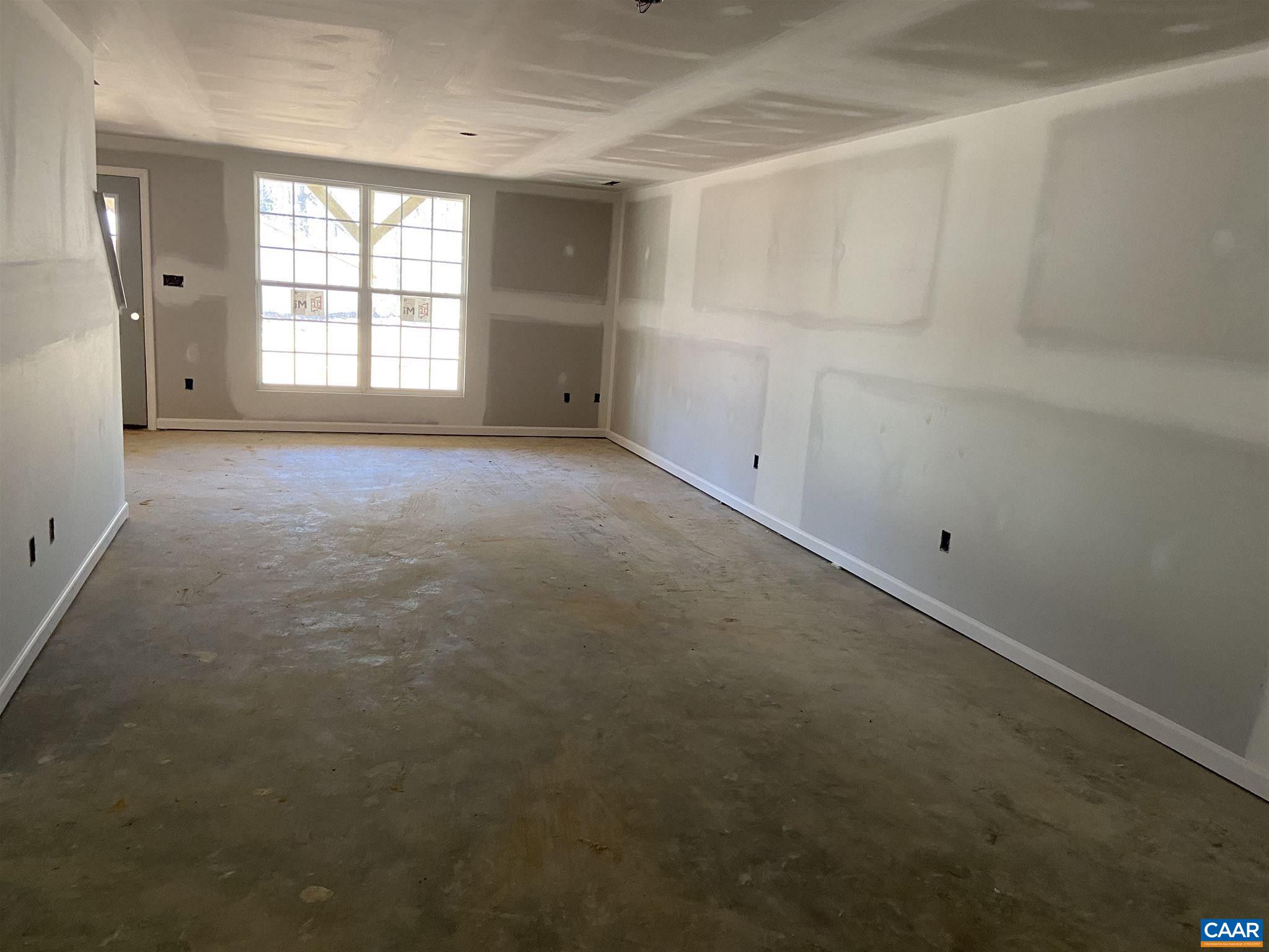 551 West Daffodil Road Ruckersville, VA 22968 - Photo 13 of 20 an empty room with windows