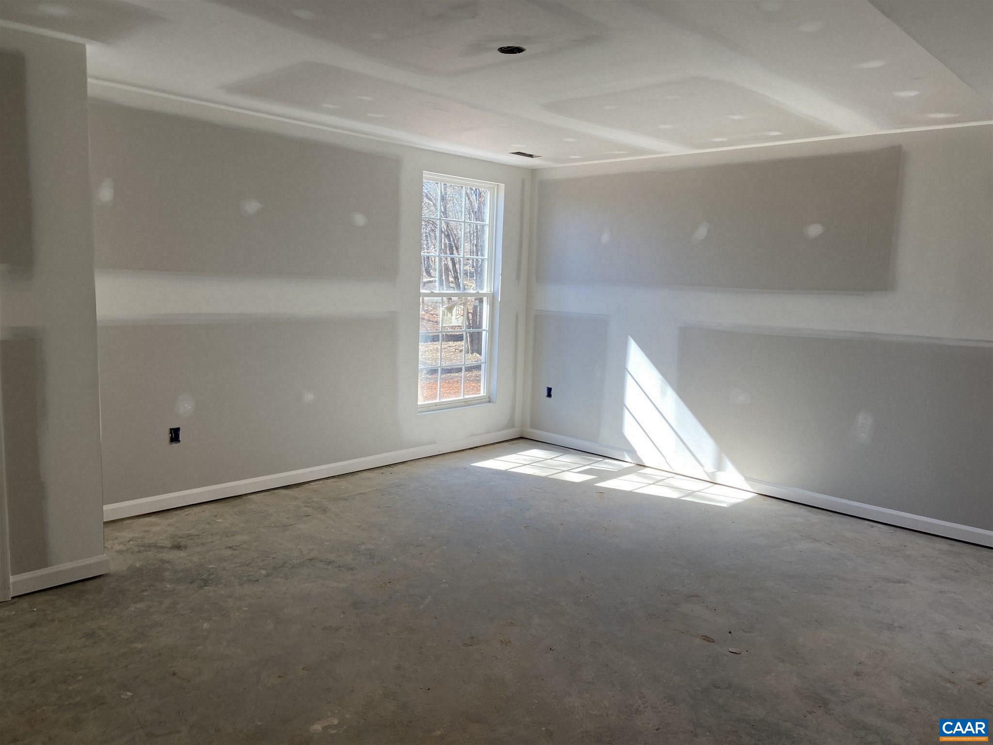 551 West Daffodil Road Ruckersville, VA 22968 - Photo 15 of 20 a view of empty room with windows