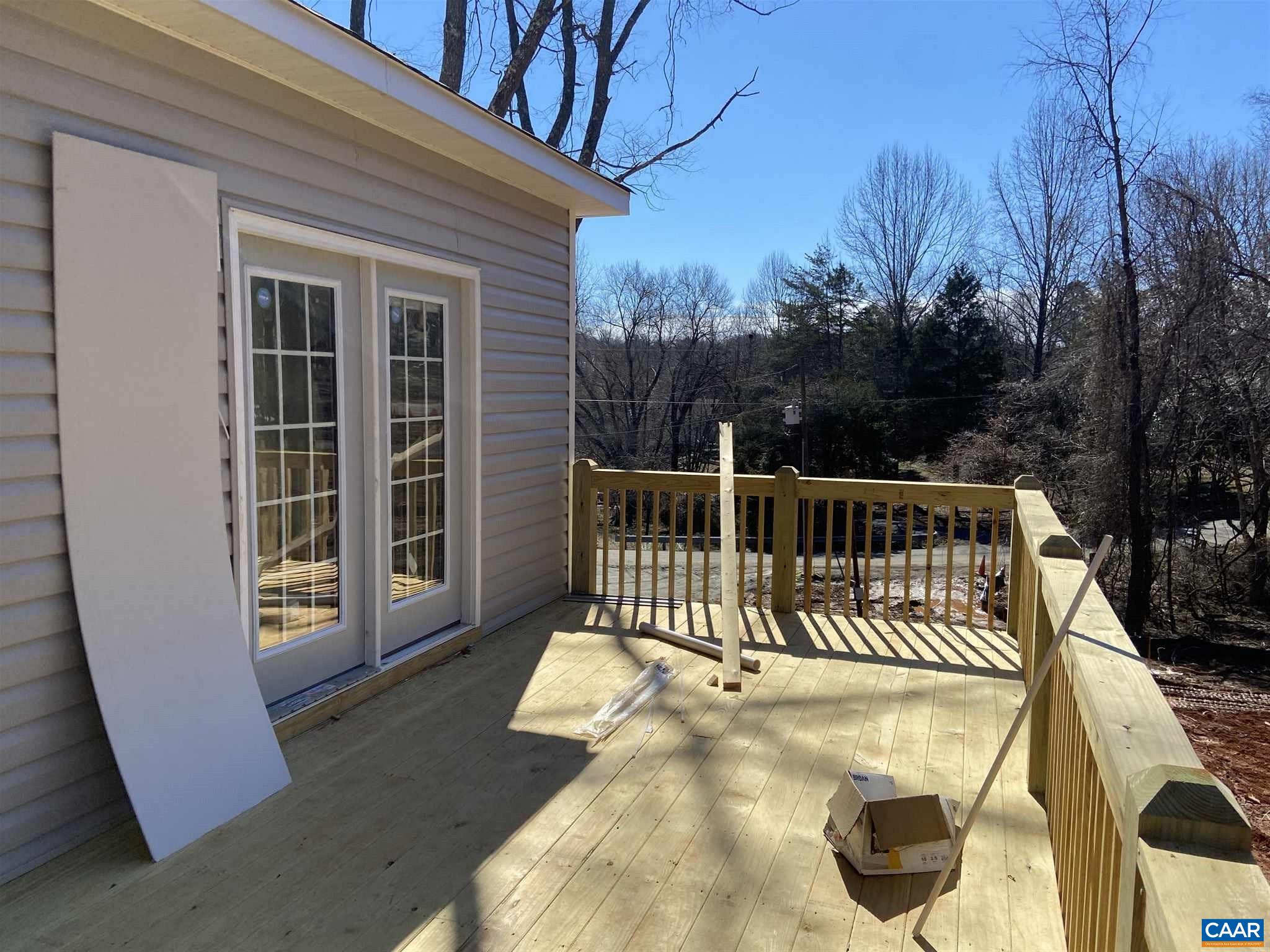 551 West Daffodil Road Ruckersville, VA 22968 - Photo 19 of 20 a view of a chair and table in the balcony
