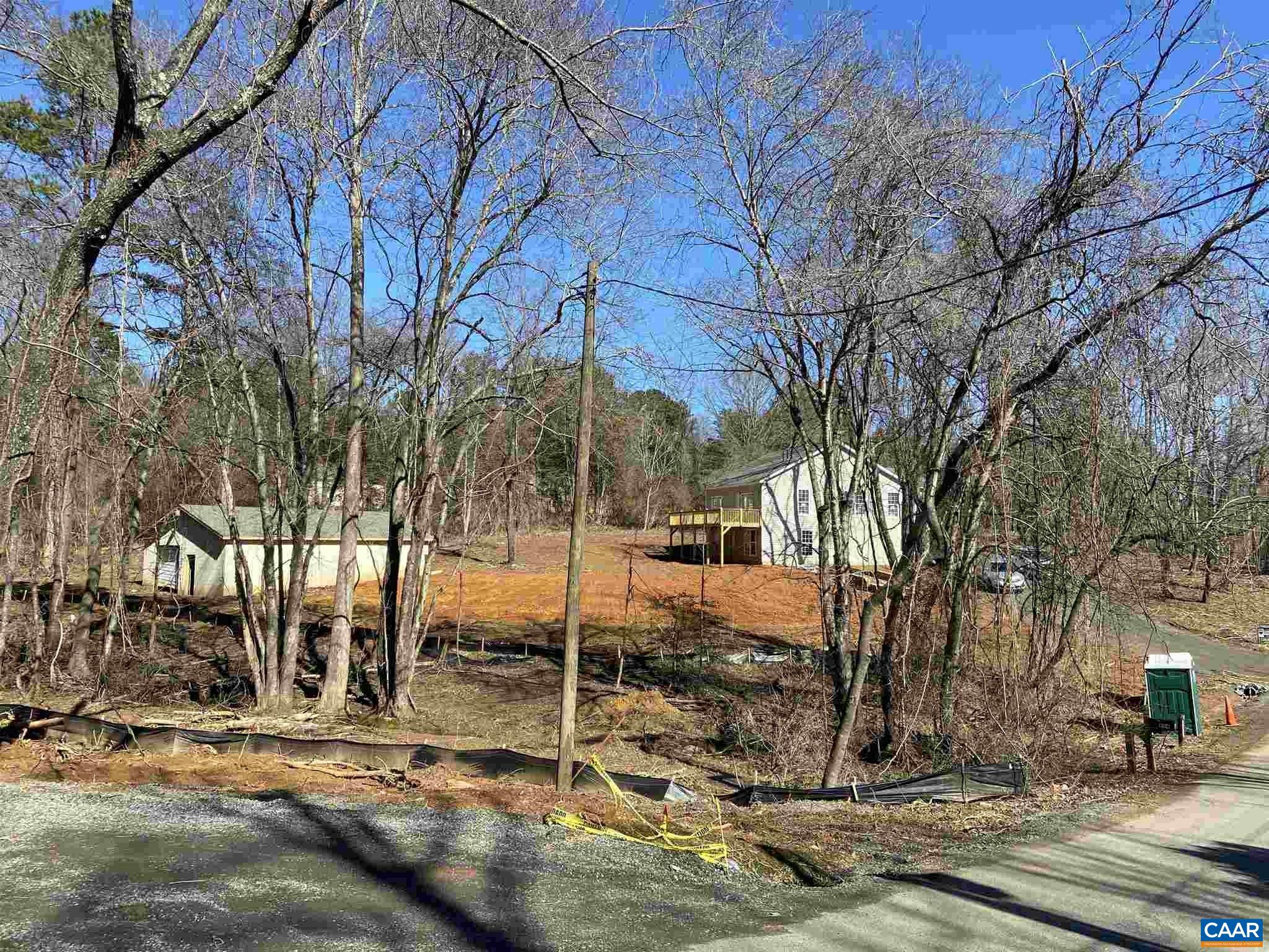 551 West Daffodil Road Ruckersville, VA 22968 - Photo 4 of 20 a view of a yard covered with snow
