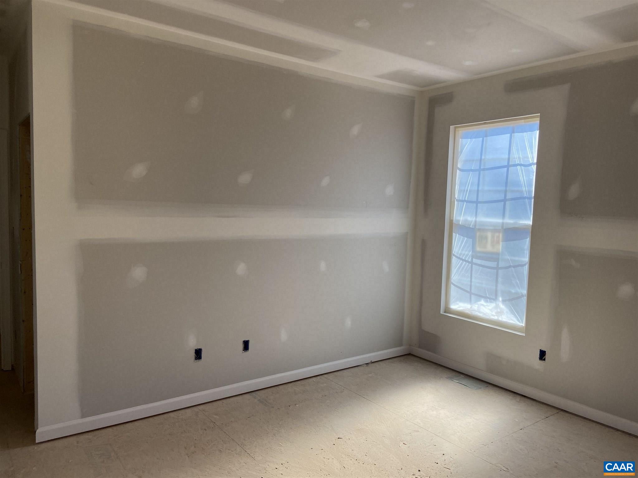 551 West Daffodil Road Ruckersville, VA 22968 - Photo 9 of 20 a view of an empty room with a window