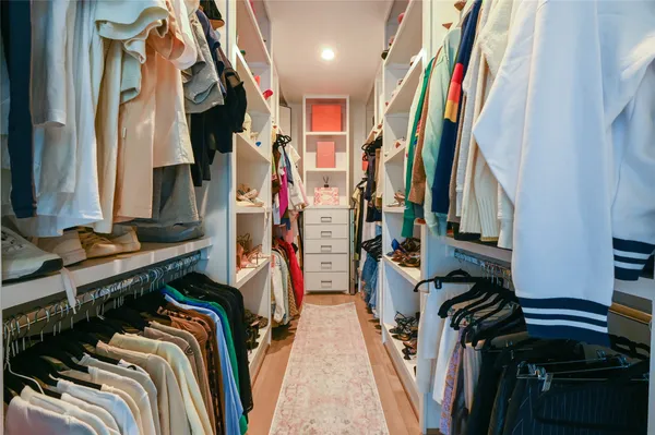 a view of a stove and storage