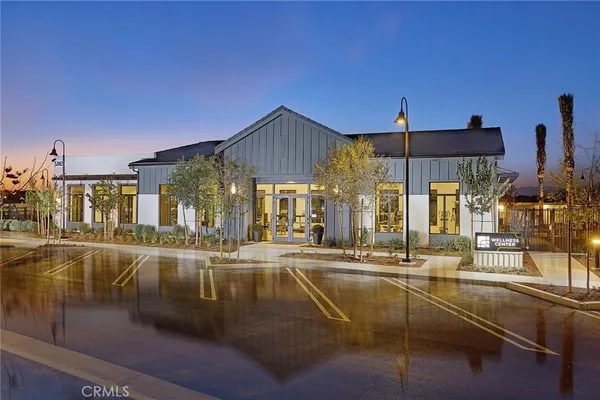 a view of a swimming pool with outdoor seating