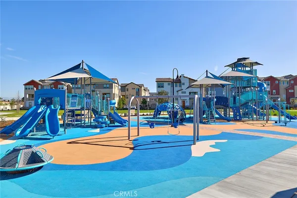 a view of a swimming pool with a lounge chairs