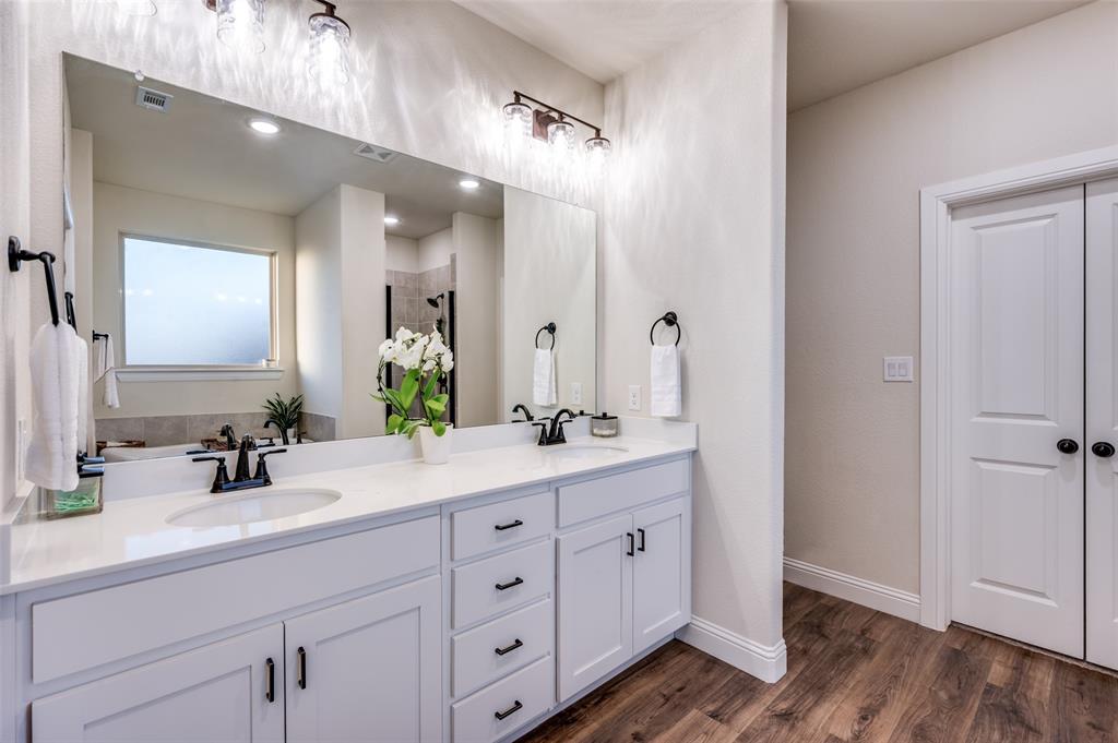 331 Osage Court Krum, TX 76249 - Photo 12 of 18 Double sinks. Walk-in closet