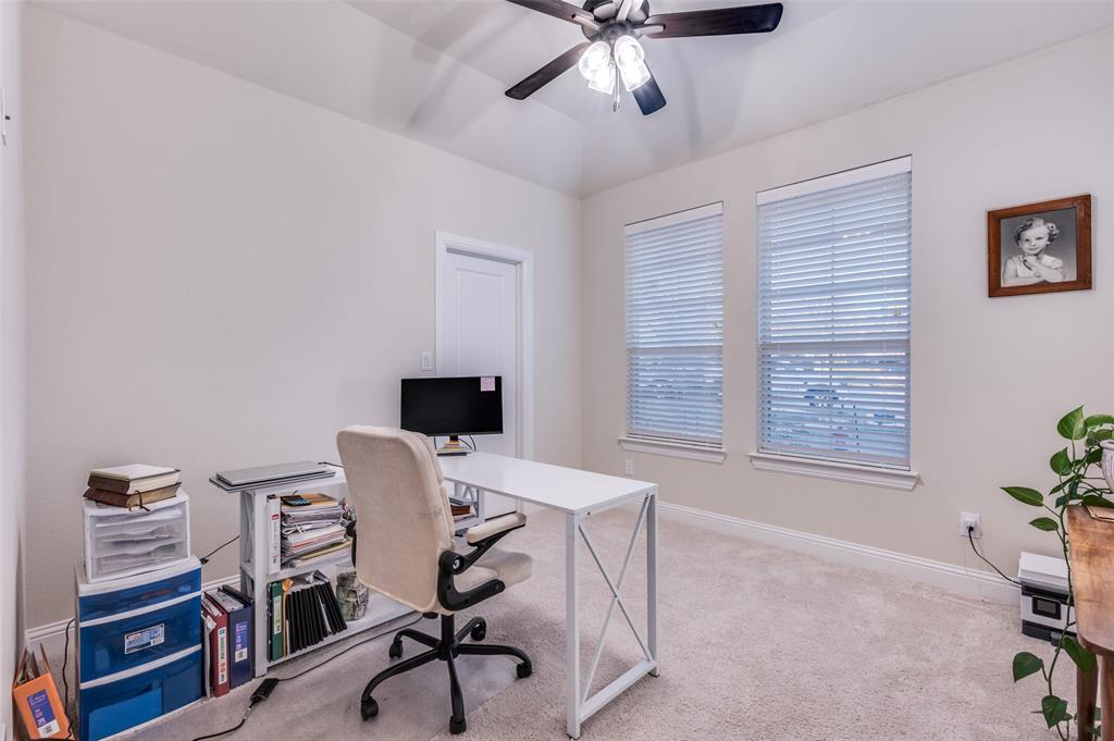 331 Osage Court Krum, TX 76249 - Photo 16 of 18 Bedroom front of house. Doubles as office. Large walk-in closet