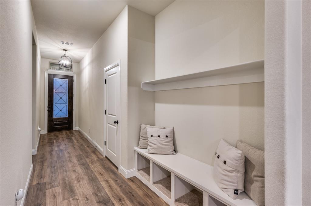 331 Osage Court Krum, TX 76249 - Photo 5 of 18 Craftsman-style front door. Built-in bench