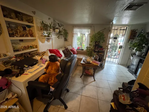a kitchen with a sink a stove and a refrigerator