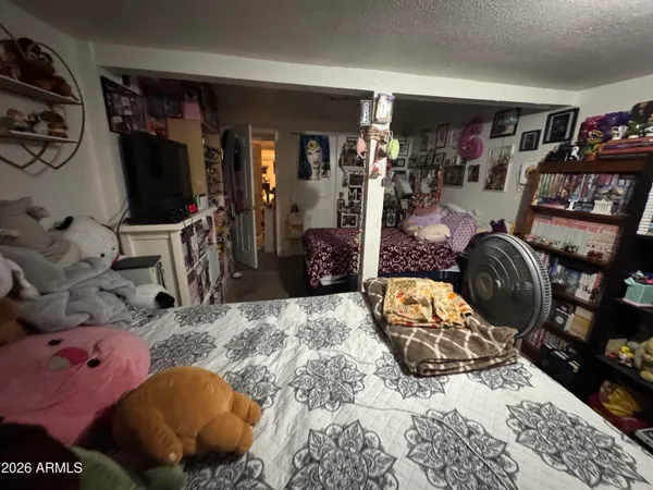 a view of a chairs and table in a patio