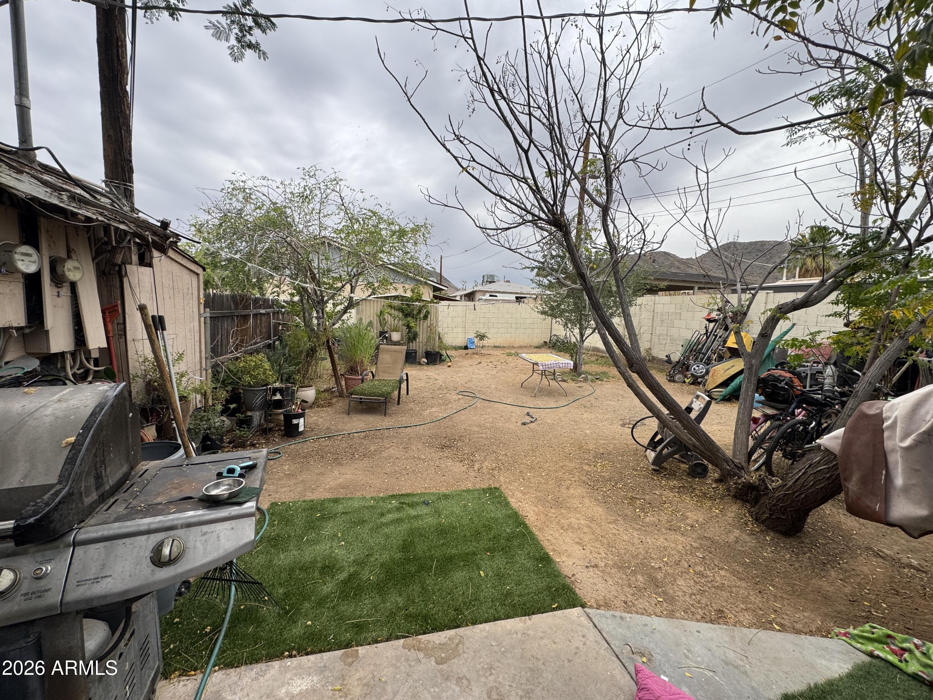 740 West Cinnabar Avenue Phoenix, AZ 85021 - Photo 23 of 26 a view of yard with patio