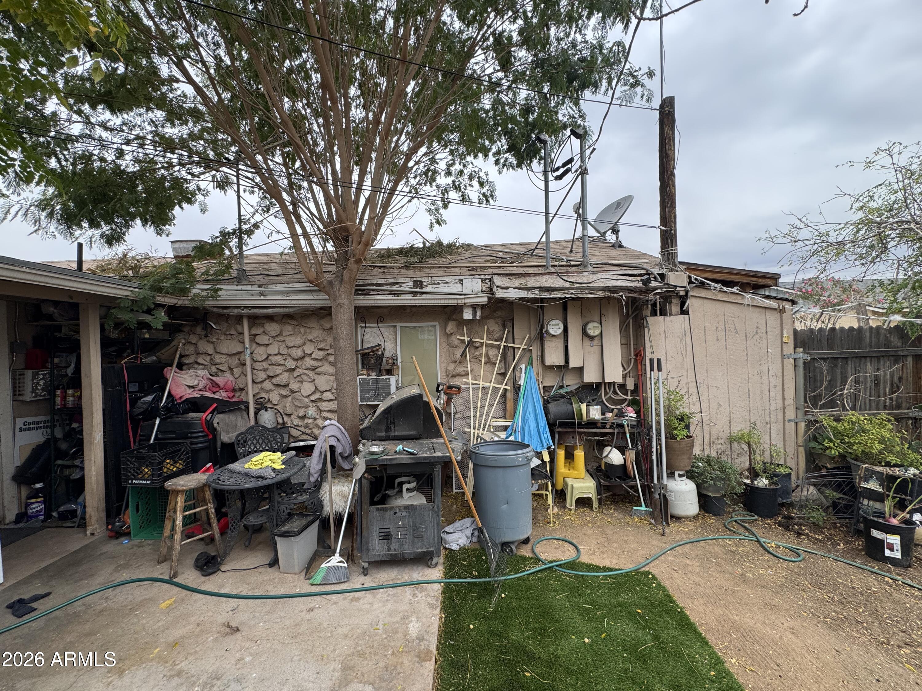 740 West Cinnabar Avenue Phoenix, AZ 85021 - Photo 24 of 26 a view of a chairs and table in a patio