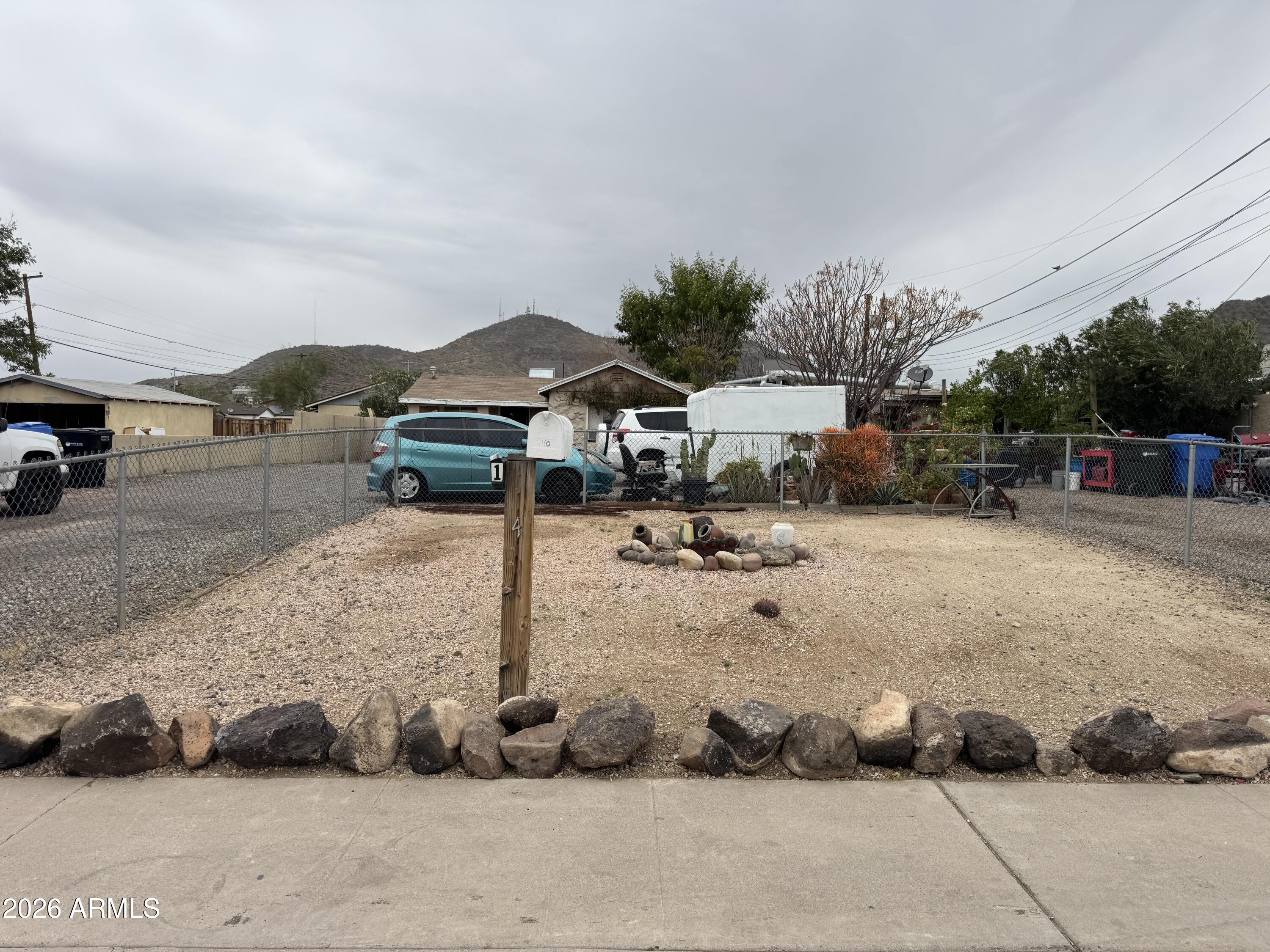 740 West Cinnabar Avenue Phoenix, AZ 85021 - Photo 4 of 26 a view of a street with cars