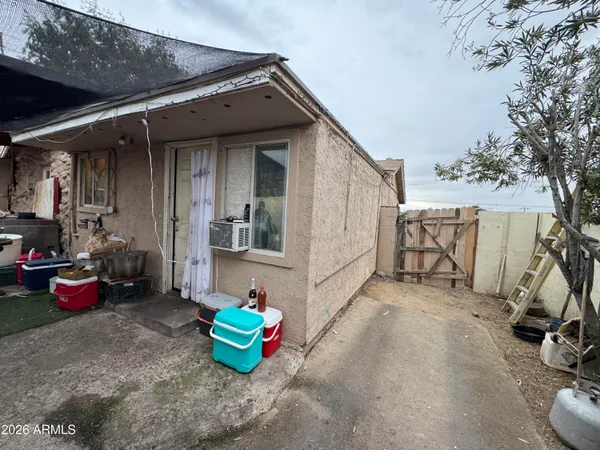 a view of a room with lots of furniture and shower