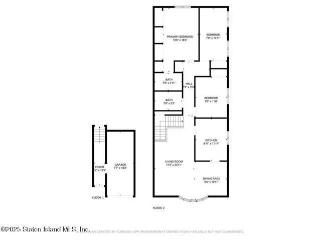 a picture of a bench in front of a gate