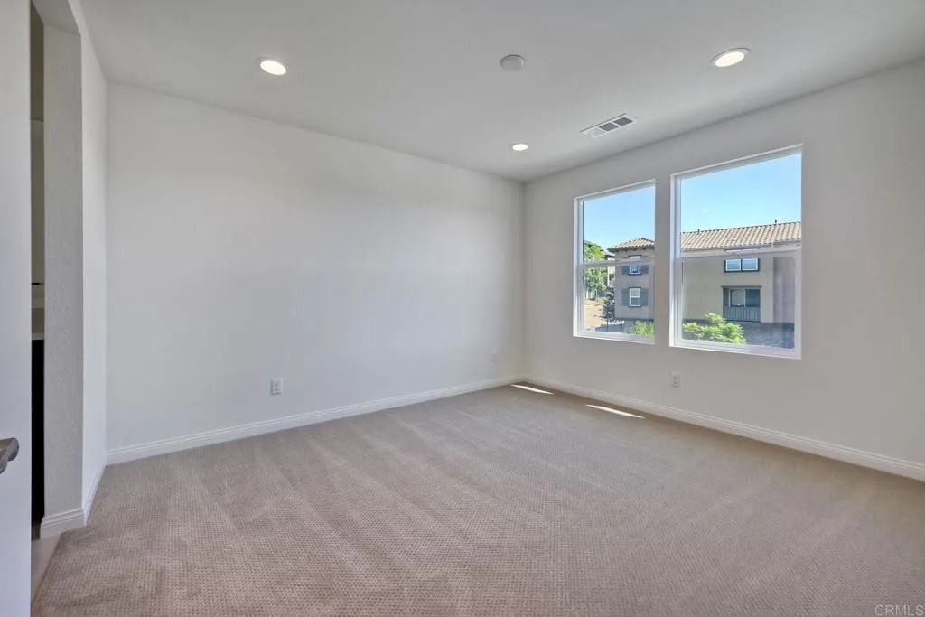 295 Mission Villas Road San Marcos, CA 92069 - Photo 15 of 29 an empty room with windows