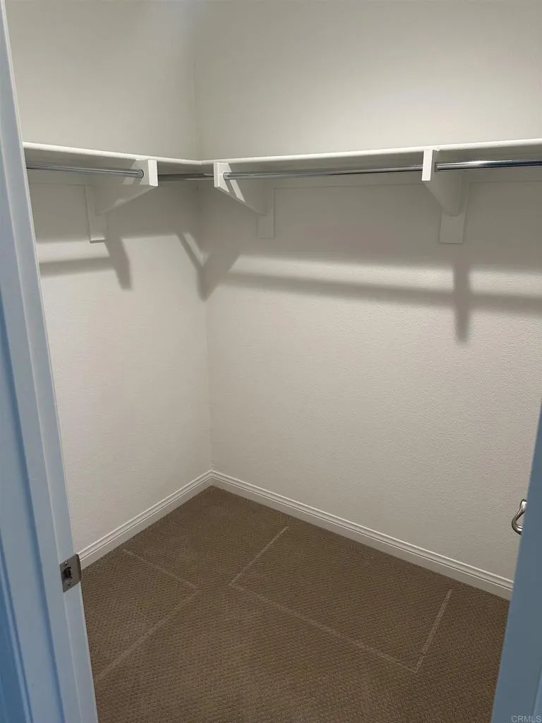 295 Mission Villas Road San Marcos, CA 92069 - Photo 17 of 29 a view of an empty walk in closet