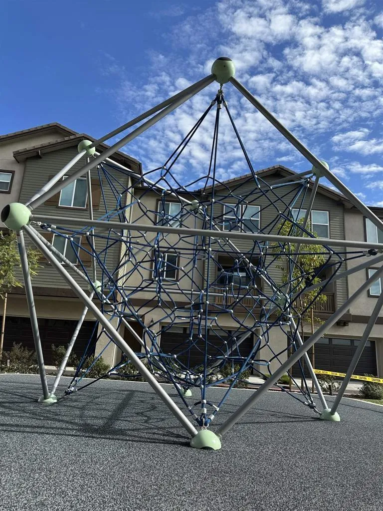 295 Mission Villas Road San Marcos, CA 92069 - Photo 23 of 29 a blue and white umbrella sitting in front of a house