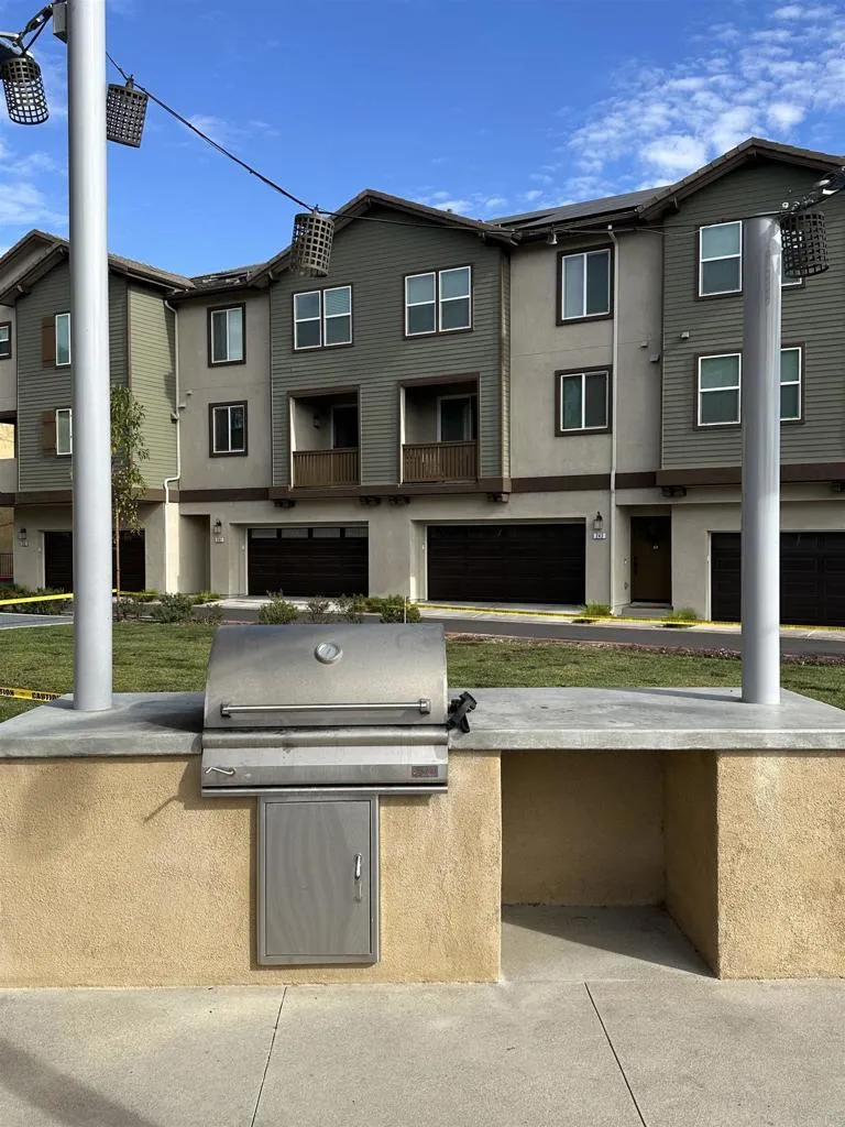 295 Mission Villas Road San Marcos, CA 92069 - Photo 26 of 29 a view of a brick building with many windows