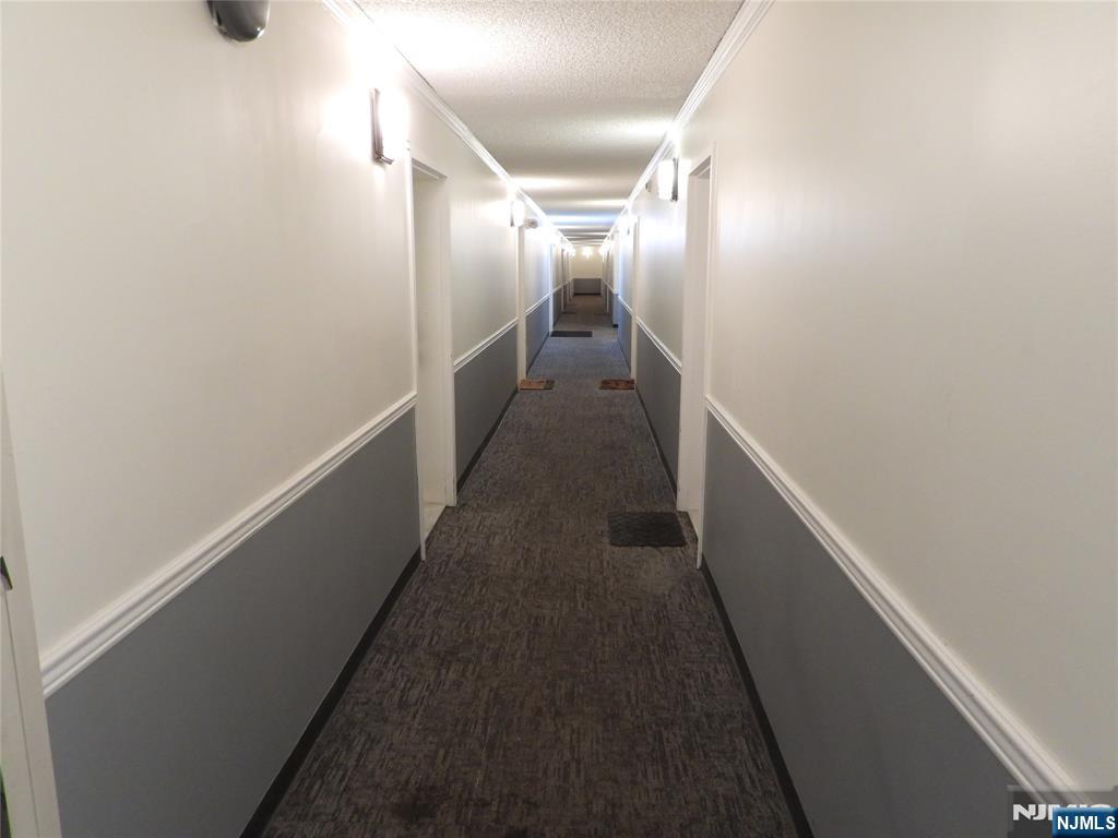 55 Clinton Place, Unit 301 Hackensack, NJ 07601 - Photo 5 of 17 a view of hallway