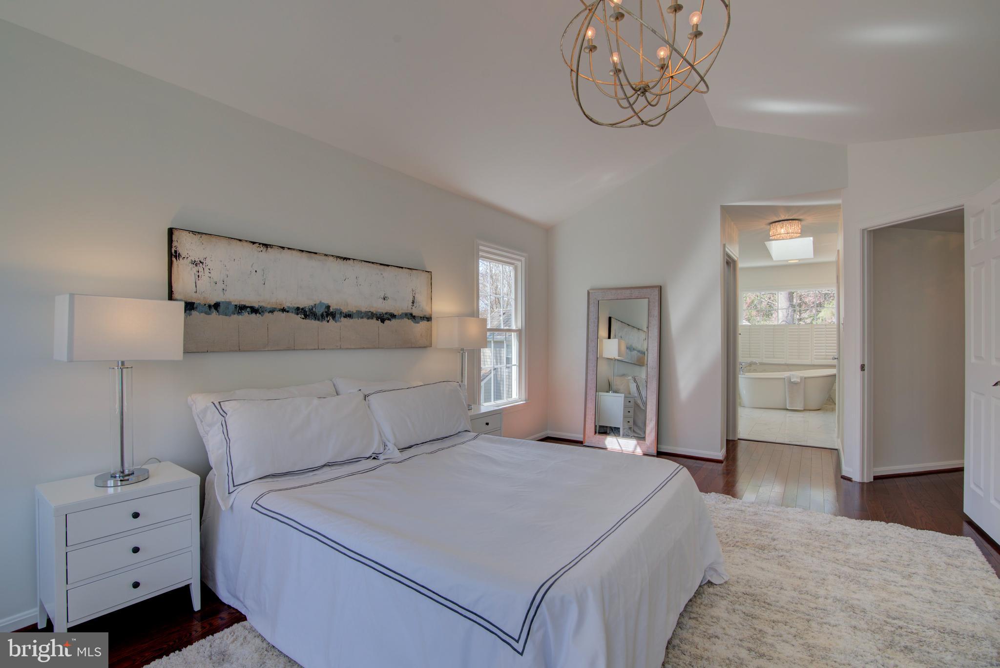 11620 Springhouse Place Reston, VA 20194 - Photo 14 of 31 Primary Suite with View to Bath, Walk-in Closet.