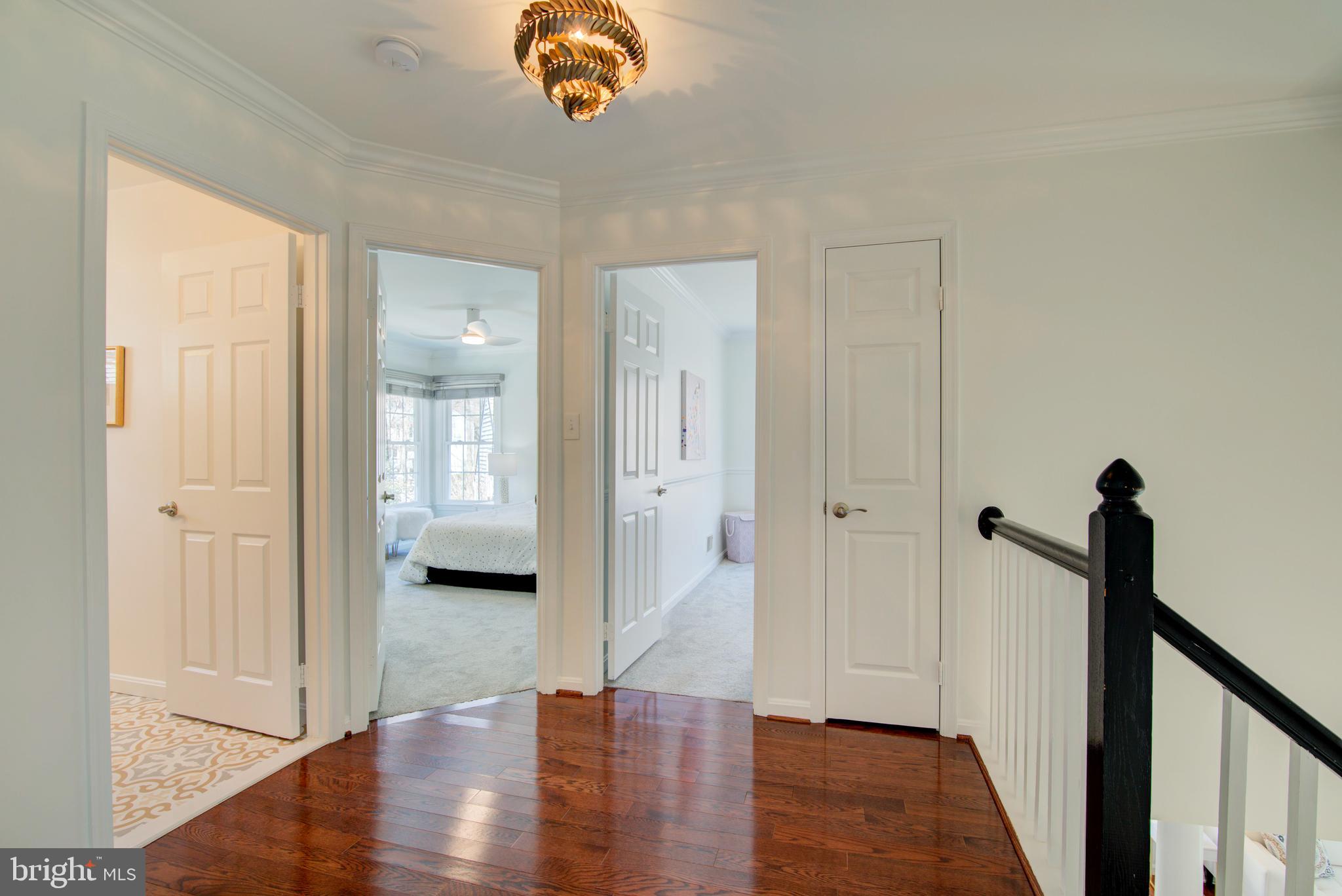 11620 Springhouse Place Reston, VA 20194 - Photo 20 of 31 Gleaming Hardwoods in Upper Level Landing.