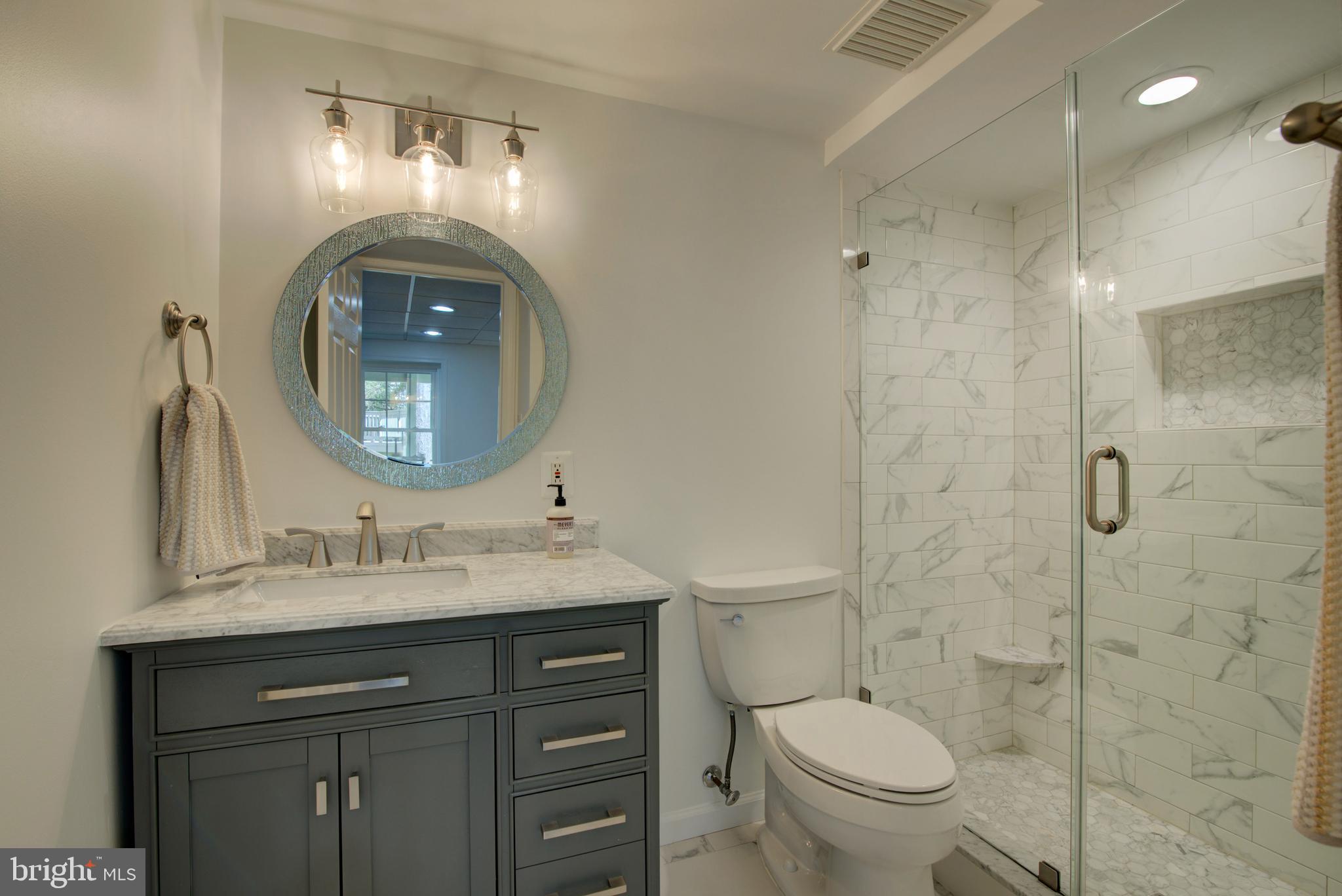 11620 Springhouse Place Reston, VA 20194 - Photo 23 of 31 Remodeled Lower Level Ensuite Full Bathroom.