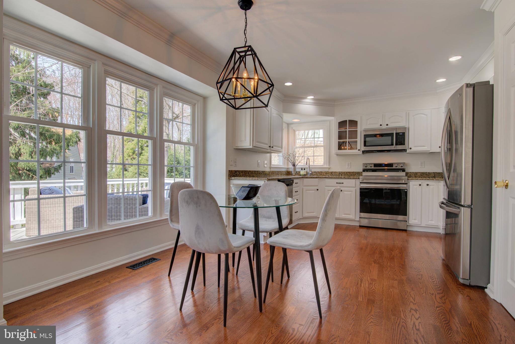 11620 Springhouse Place Reston, VA 20194 - Photo 7 of 31 Sunny Kitchen and Breakfast Area.