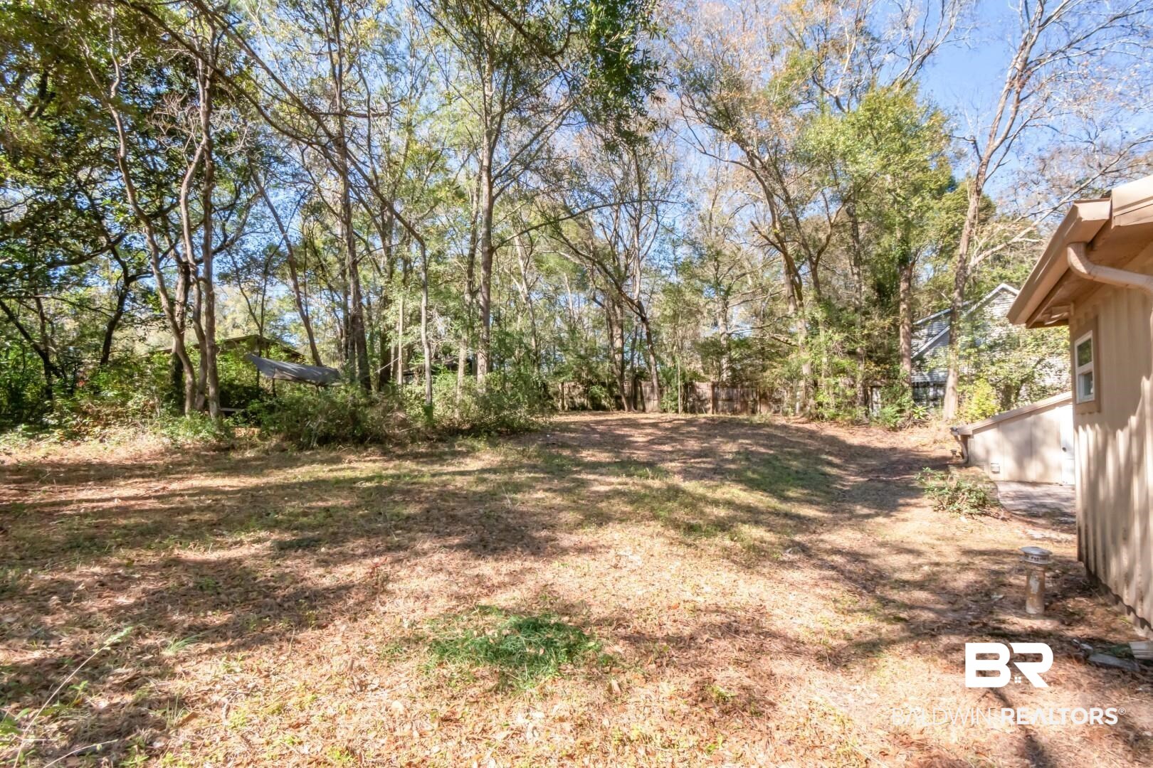 410 St John Place Mobile, AL 36609 - Photo 24 of 32 View of yard with view of wooded area