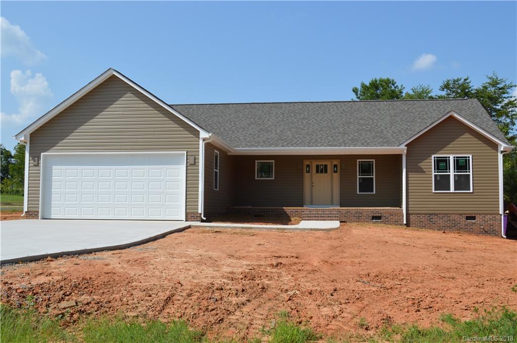 4831 Kemp Dellinger Road Maiden, NC 28650 - Photo 1 of 20 a front view of a house with a yard and garage
