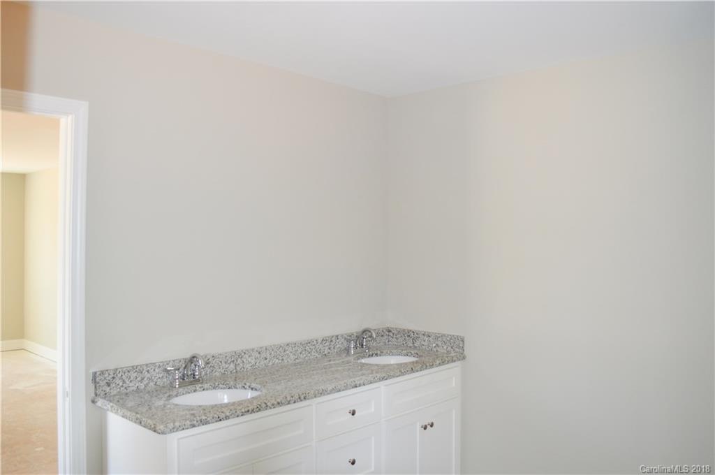 4831 Kemp Dellinger Road Maiden, NC 28650 - Photo 11 of 20 a bathroom with a granite countertop sink and vanity