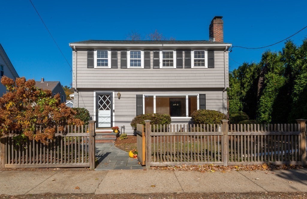 114 Spring Street Stoneham, MA 02180 - Photo 1 of 41 a front view of a house with iron fence