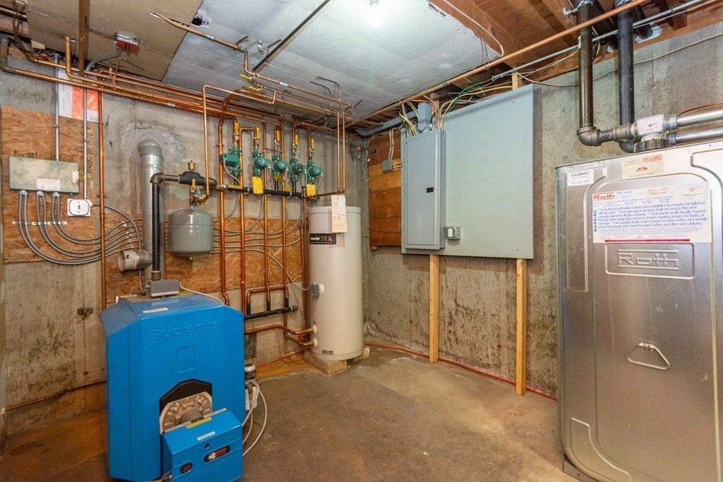 114 Spring Street Stoneham, MA 02180 - Photo 35 of 41 a view of storage and utility room