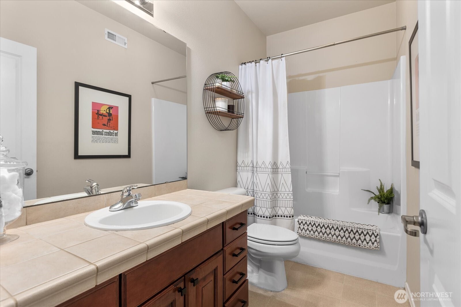 14915 38th Drive Southeast, Unit S1148 Bothell, WA 98012 - Photo 21 of 37 a bathroom with a sink a toilet and shower